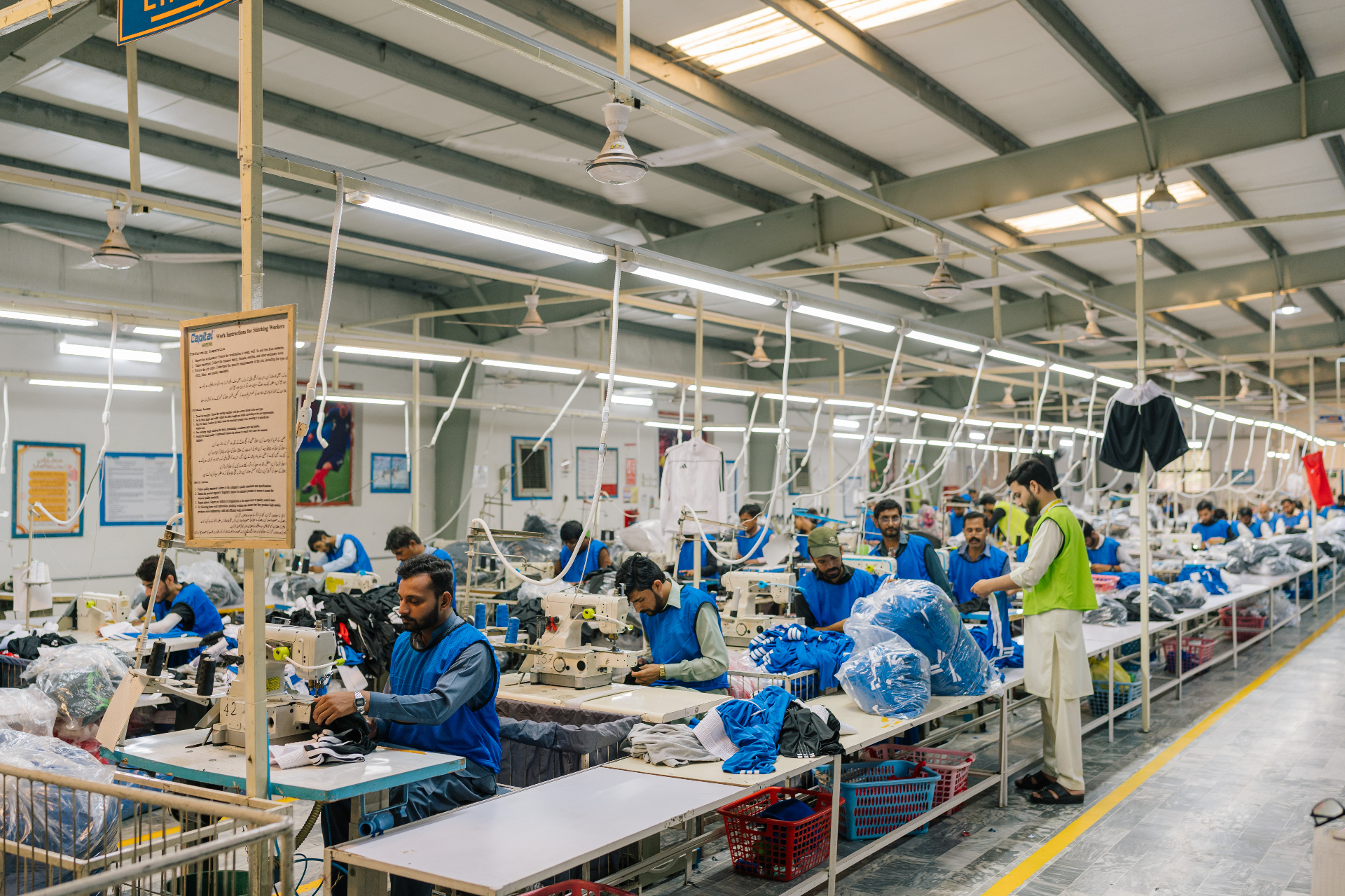 CedarEx Sialkot factory — sports apparel and bag stitching lines