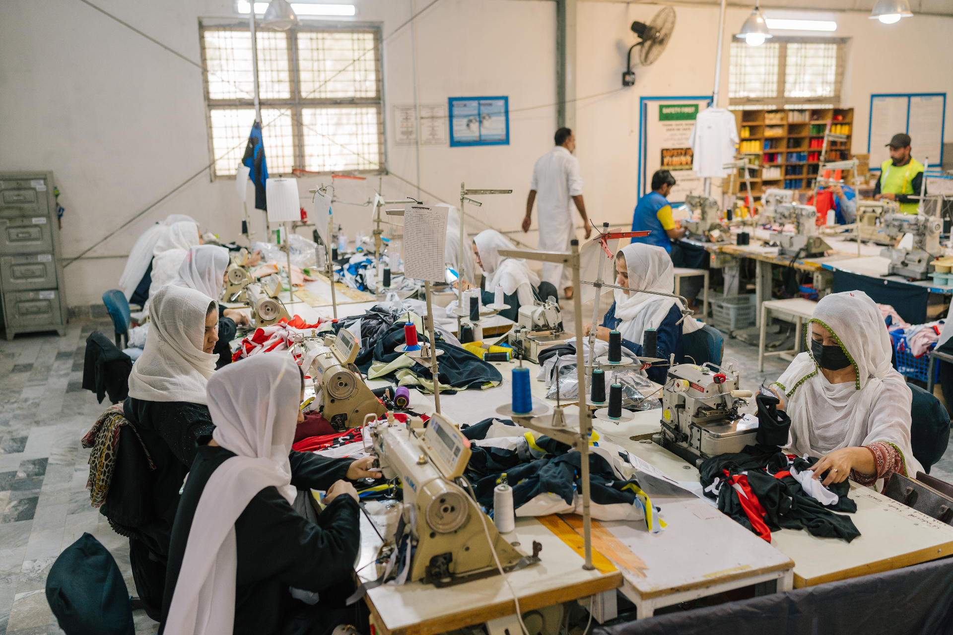 CedarEx Sialkot factory — sports apparel and bag stitching lines